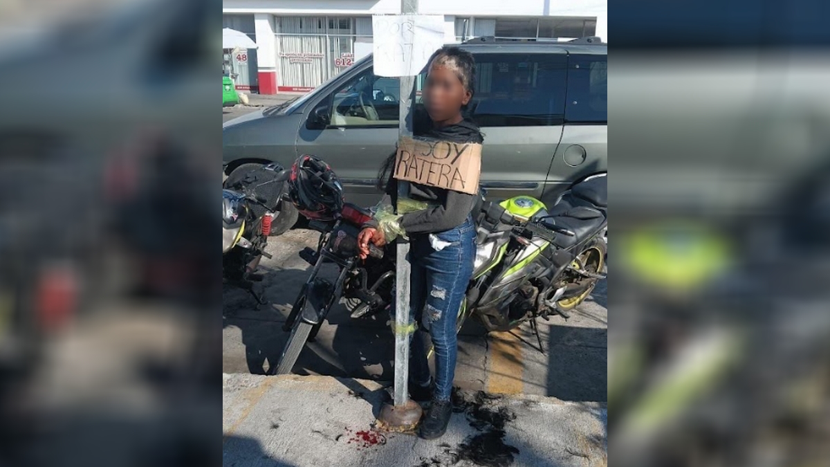 Mujer amarrada a poste por presunto robo en Celaya