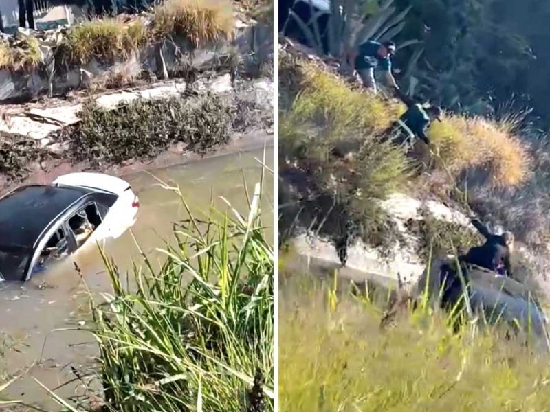 Vecinos usan cuerdas para rescatar a pareja que cayó a Canal de Coria en su auto