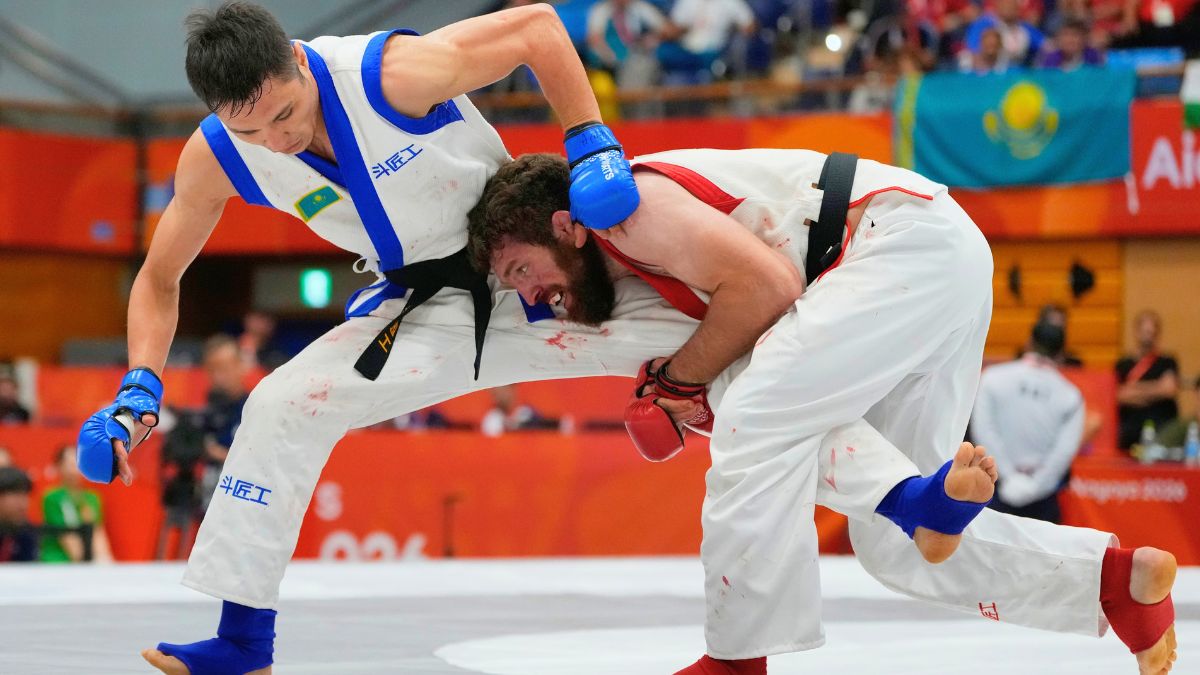 Un combate de artes marciales mixtas en Asia. AP.